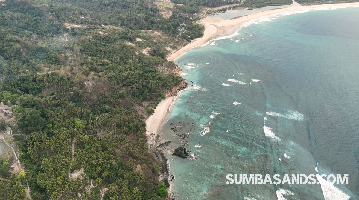 A sweeping aerial drone photograph highlighting the 9,640 sqm freehold boundary marked in yellow on an elevated coastal cliff in Wai Hura. The plot overlooks vibrant turquoise ocean waters and crashing white surf.